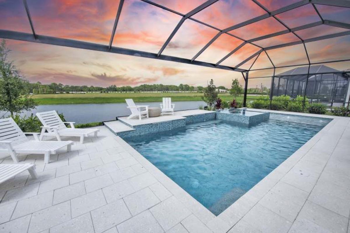 Vivid Shores Brixton model home, screened pool and spa with unobstructed lake view